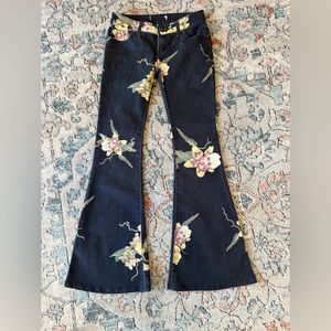 Free People floral flares. SIZE: 00 and hemmed to the height of a 5’2’’ person.